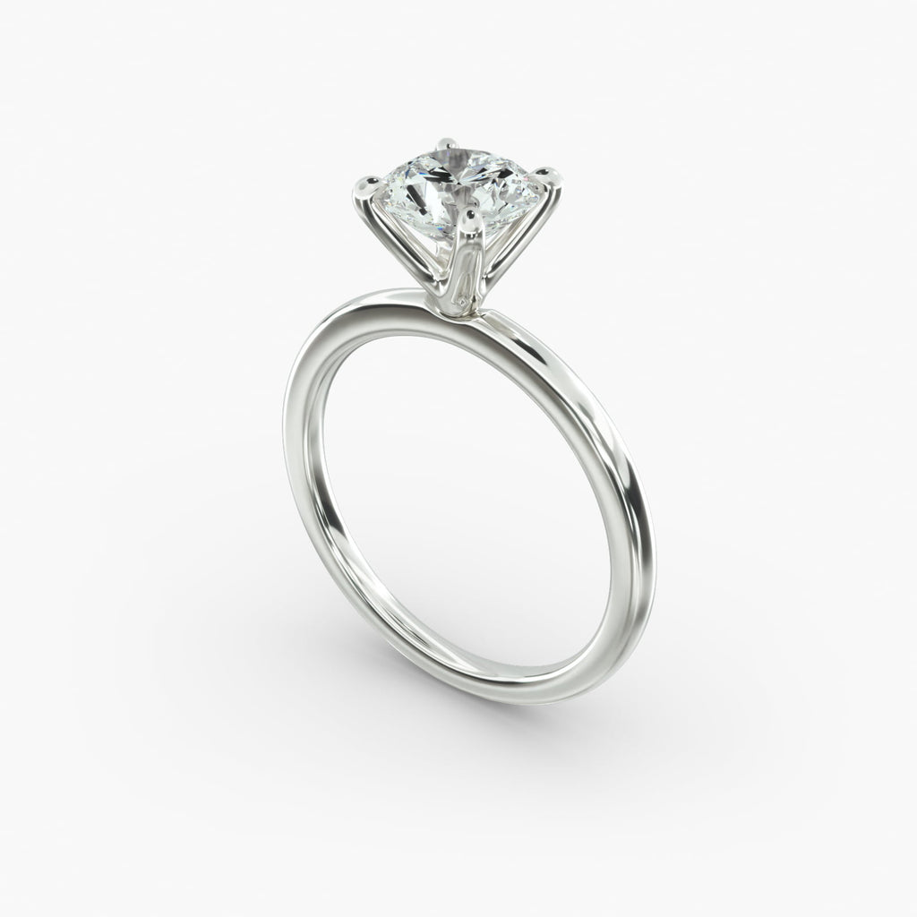 Classic round brilliant lab grown diamond solitaire engagement ring in 14K white gold angle view.