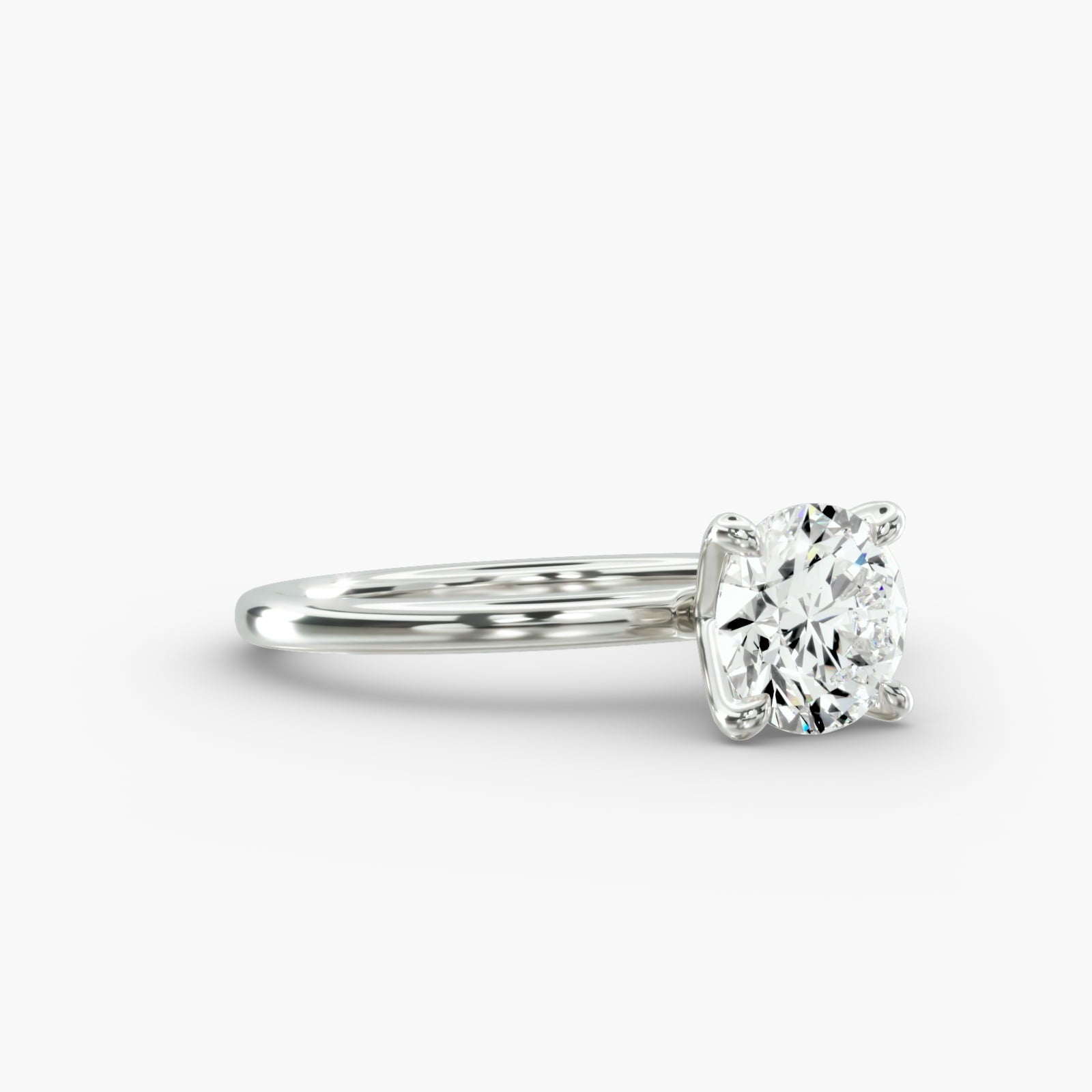 Classic round brilliant lab grown diamond solitaire engagement ring in 14K white gold side view
