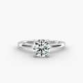 Classic round brilliant lab grown diamond solitaire engagement ring in 14K white gold.