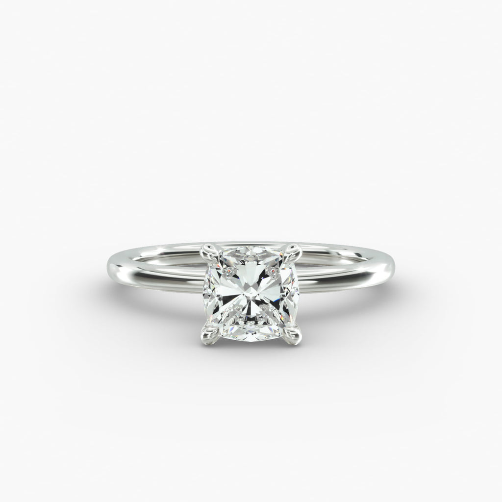 Cushion cut lab grown diamond solitaire engagement ring in 14K white gold.