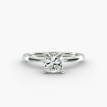 Cushion cut lab grown diamond solitaire engagement ring in 14K white gold.