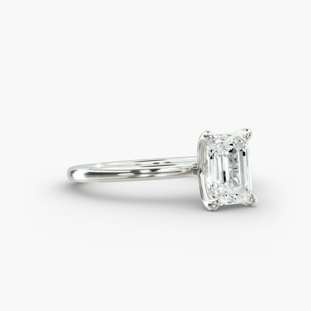 Emerald cut lab grown diamond solitaire engagement ring in 14K white gold side view
