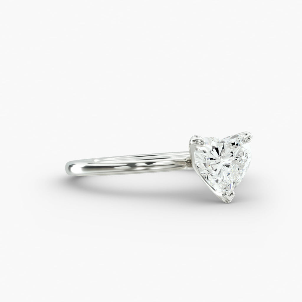 Heart shape lab grown diamond solitaire engagement ring side view in 14K white gold side view