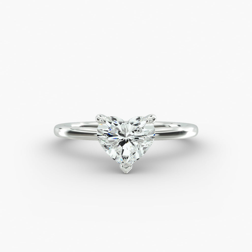 Heart shape lab grown diamond solitaire engagement ring in 14K white gold.
