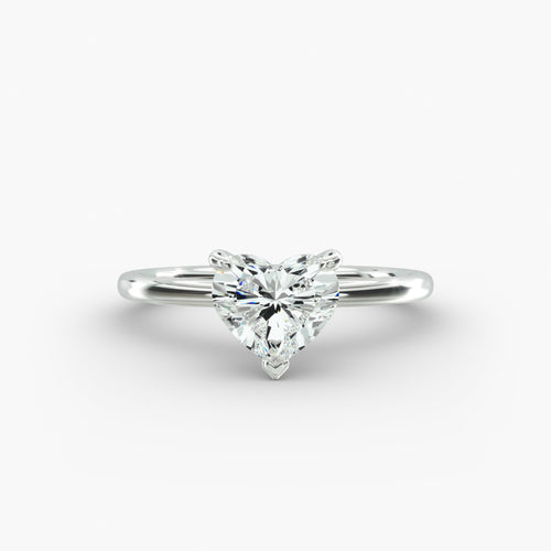 Heart shape lab grown diamond solitaire engagement ring in 14K white gold.