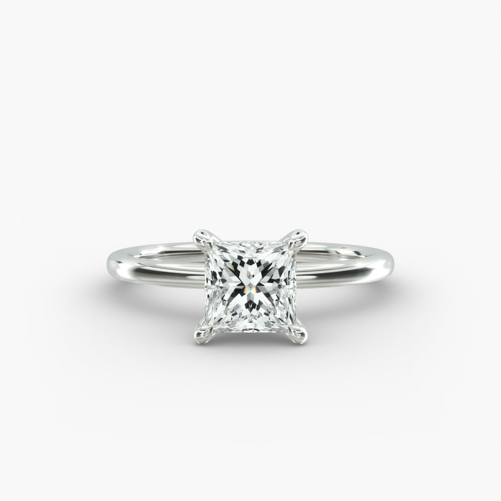Minimalist princess cut lab grown diamond solitaire ring in 14K white gold.