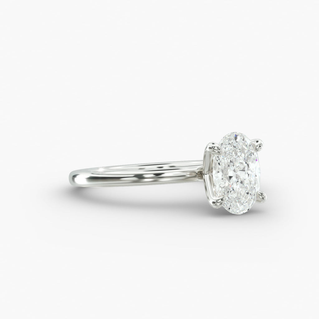 Oval cut lab grown diamond solitaire engagement ring in 14K white gold side view