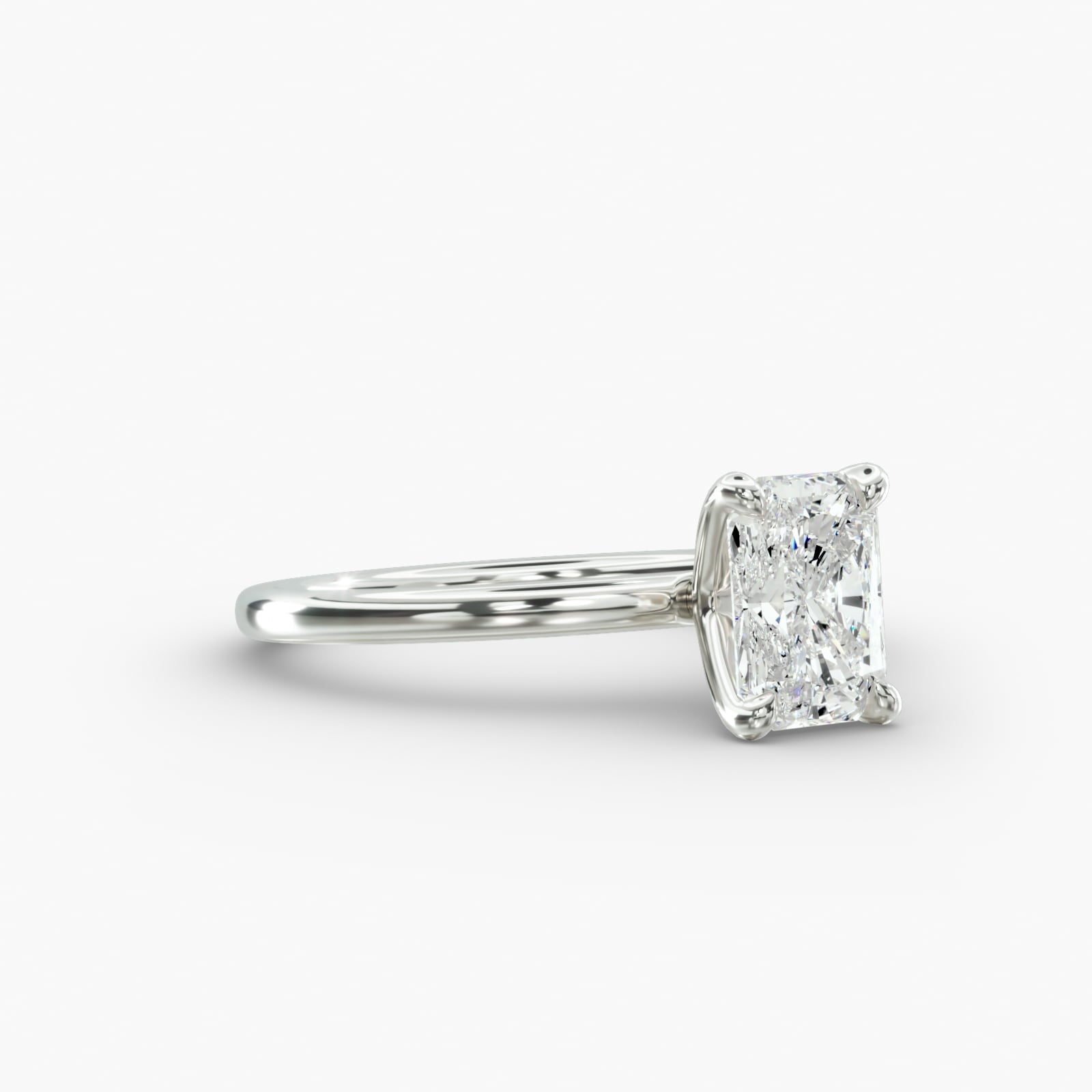 Radiant cut lab grown diamond solitaire engagement ring in 14K white gold side view