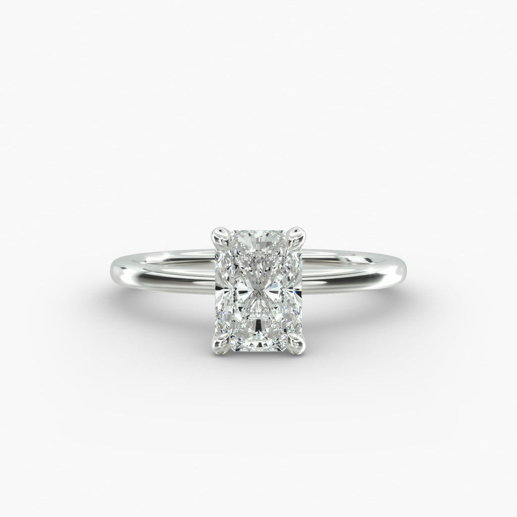 Radiant cut lab grown diamond solitaire engagement ring in 14K white gold.