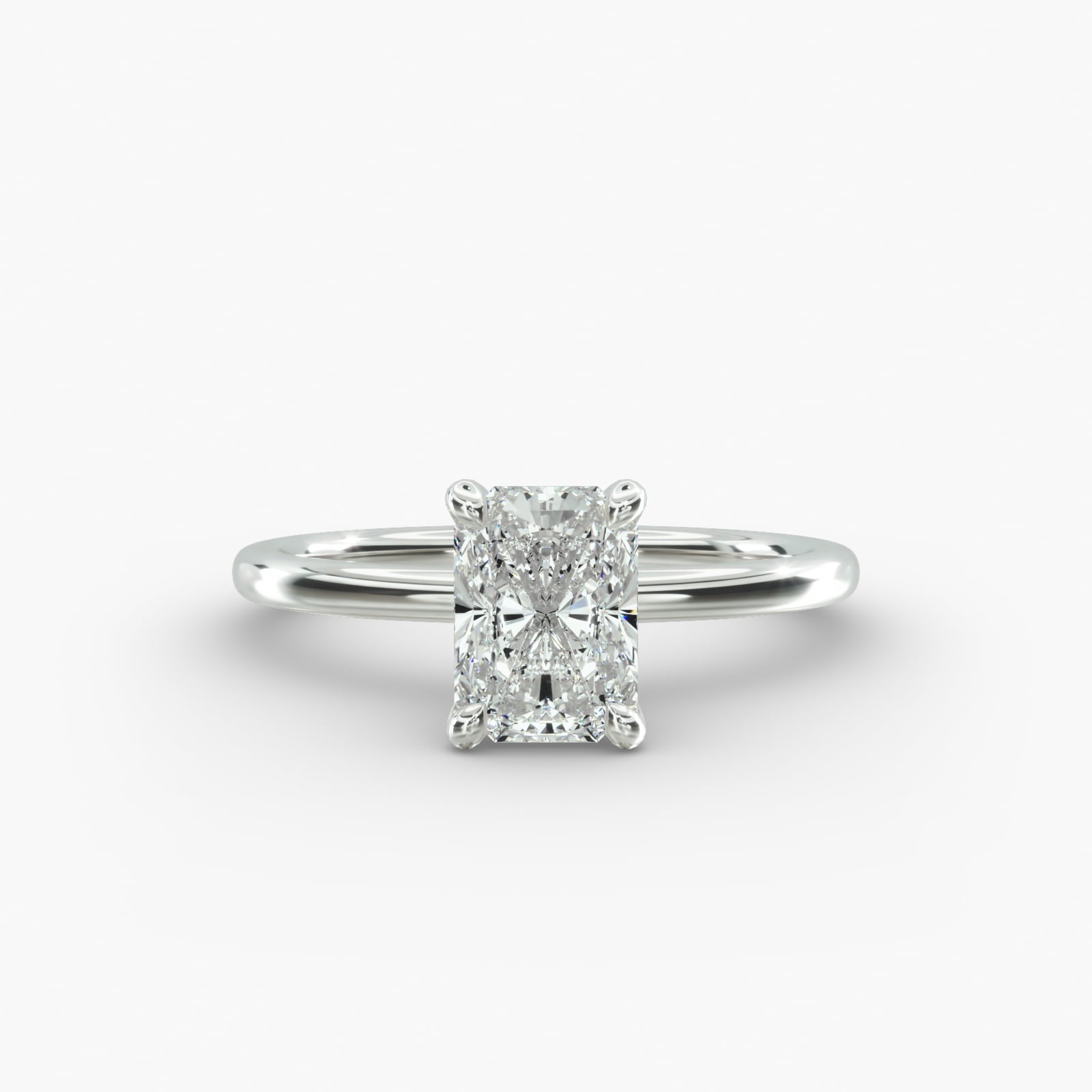 Radiant cut lab grown diamond solitaire engagement ring in 14K white gold.