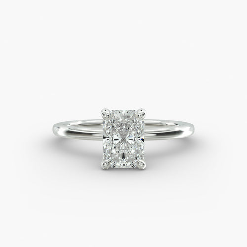 Radiant cut lab grown diamond solitaire engagement ring in 14K white gold.