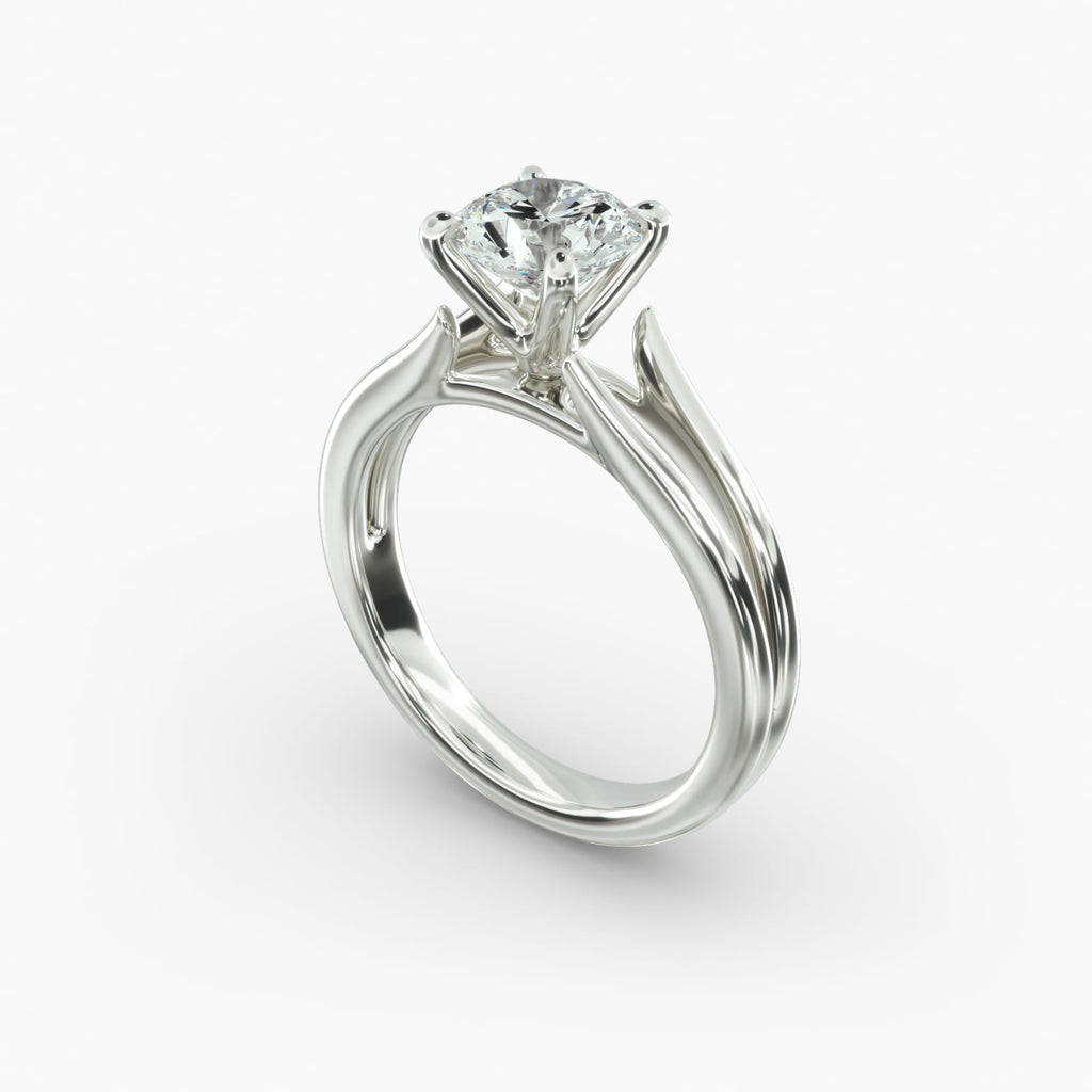 Round cut lab grown diamond split shank solitaire engagement ring in 14K white gold angle view.