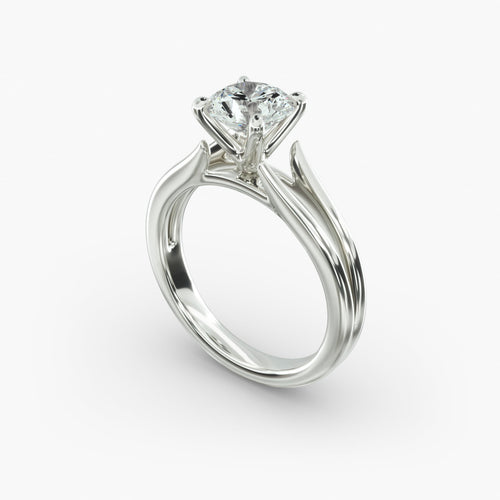 Round cut lab grown diamond split shank solitaire engagement ring in 14K white gold angle view.